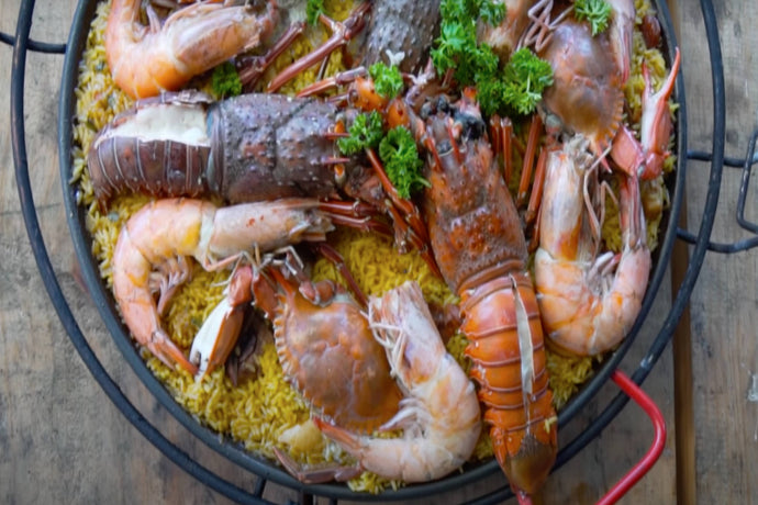 Charcoal grilled Seafood Paella with Giant Shrimp, Lobsters and Crabs